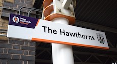 The Hawthorns station sign